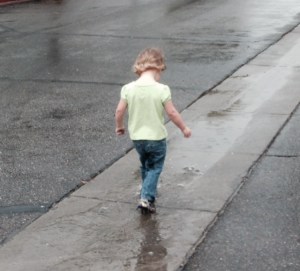 Forget the sidewalk, I'm splashing my way through the gutter. Isn't that what it's here for?